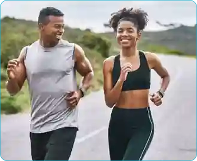 two person running on the road